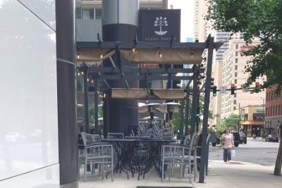 Exterior of Siena Tavern on a sunny day