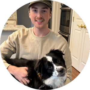 portrait of young male adult with dog
